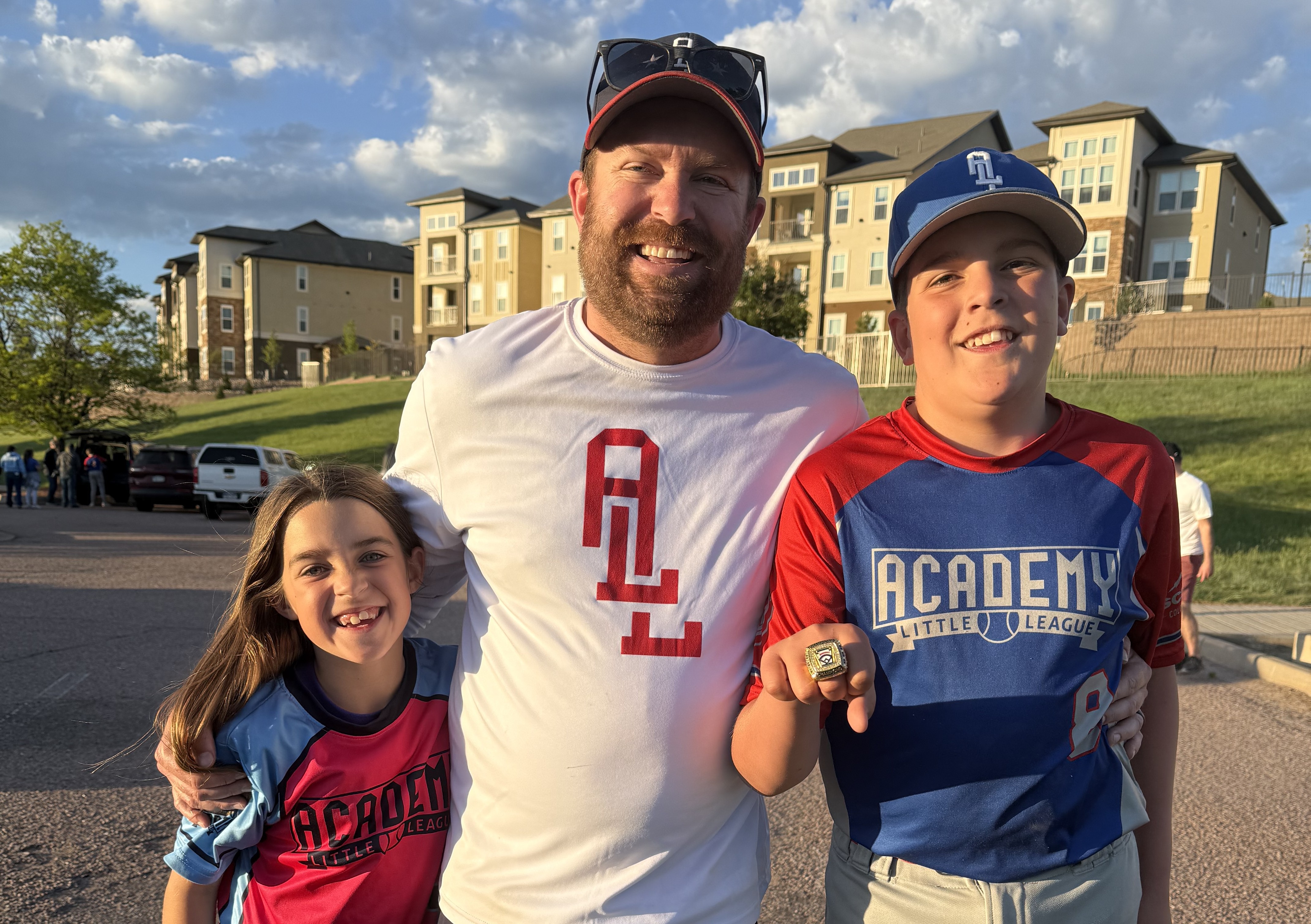 Jacob and his kids at a game